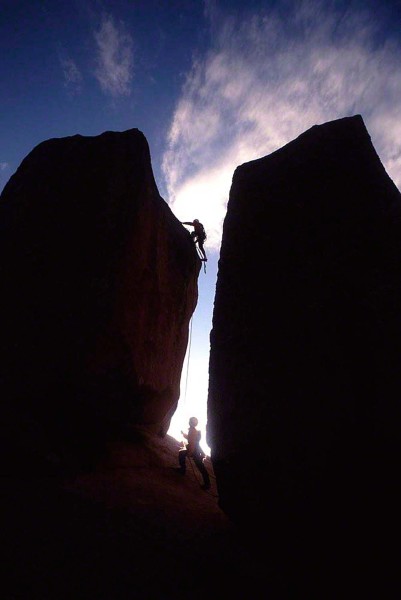 2-men-climbing-up-rock_DM