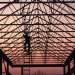 man climbing up ladder on building frame thumbnail