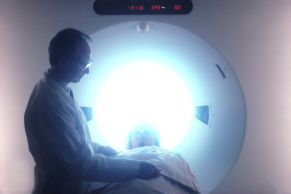 Technician giving an MRI to a patient
