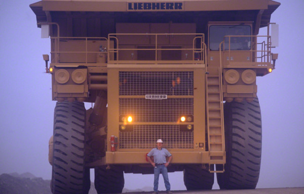 world's largest truck with a man in front0930