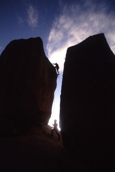 2 men climbing up rock 0946