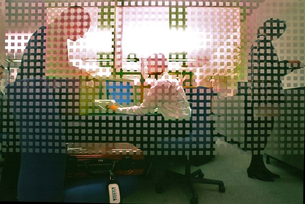 office-through-checkered-glass