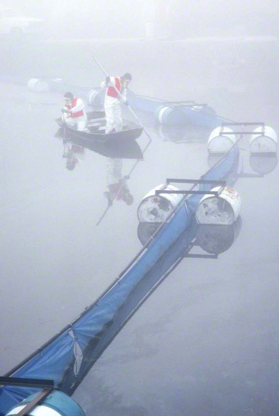 Copy-of-workers-at-a-toxic-waste-dump-in-the-fog-04761-402x600_DM