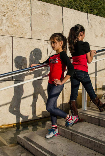 The color red, the word "indifference, and the use of shadows.