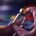handsholdingsmallglassvial0981-600x401_DM thumbnail