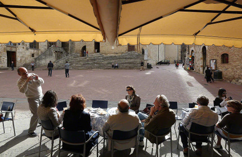 friends taking pictures of friends in Tuscany.