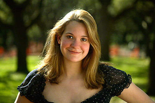 Long lens at it's minimum focusing distance/widest aperture. 